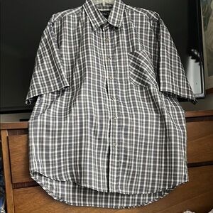 Brand new men’s Gray and White Checkered Shirt. Never worn. Excellent condition.